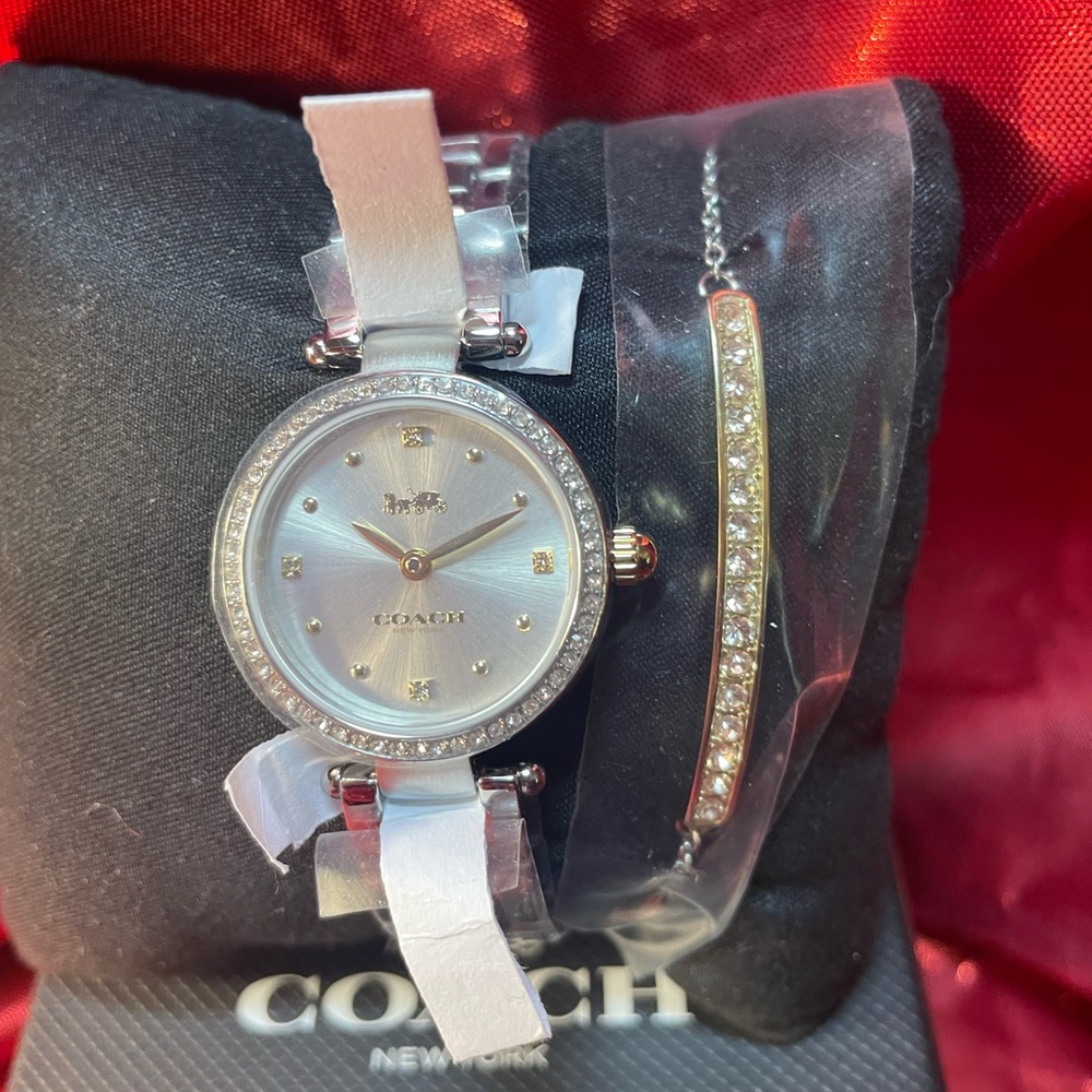 Coach Women's Silver and White Watch with Bracelet.